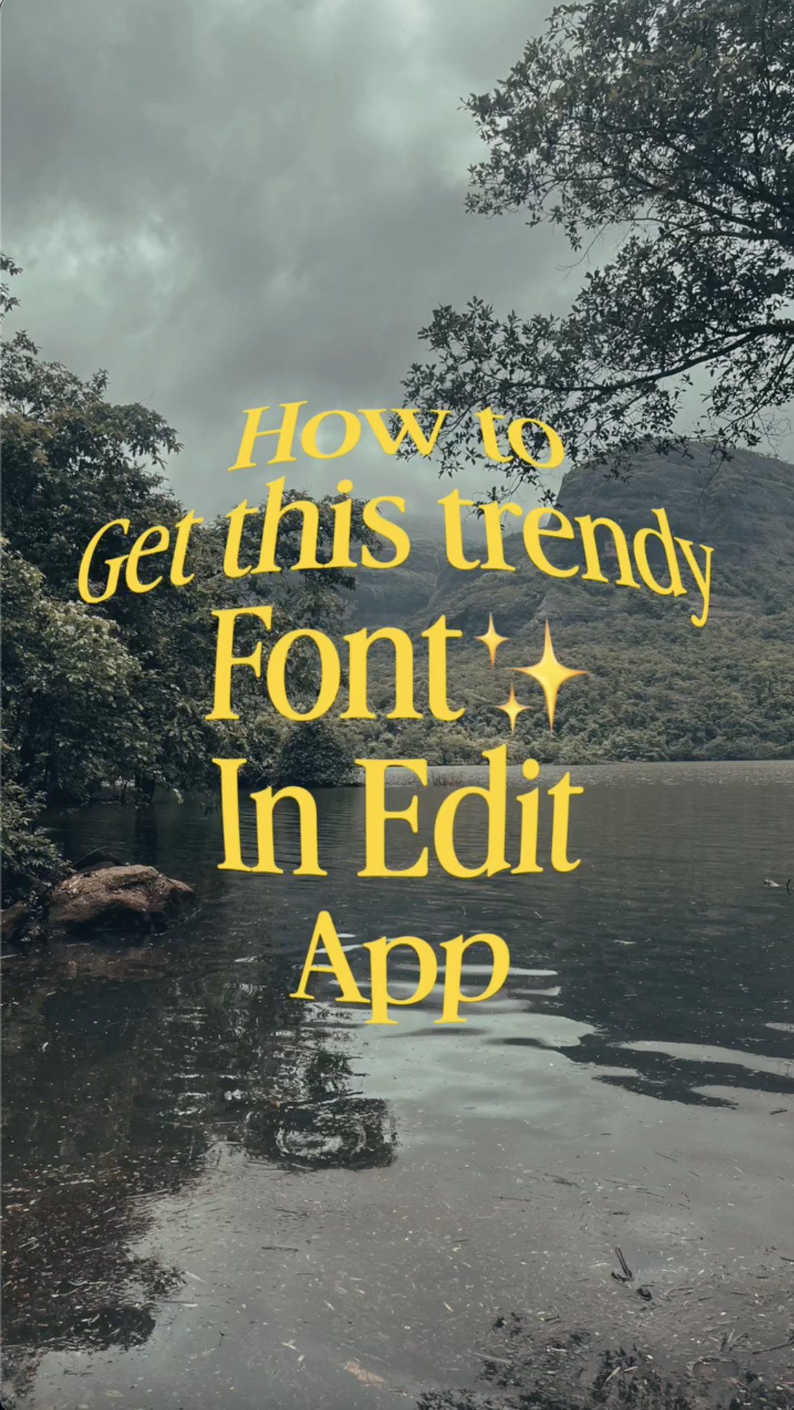 Vertical screenshot from digitalcontouring's tutorial. Huge yellow serif text reading "How to Get this trendy Font In Edit App" fills most of the frame, set against a moody lake-and-mountains landscape. No person on screen.